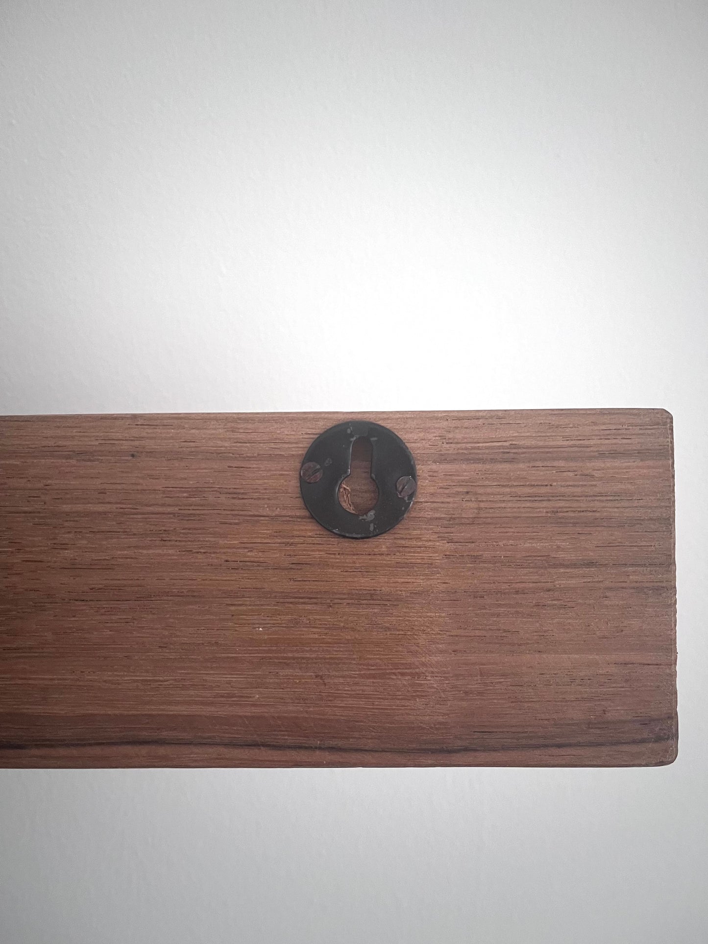 back of wooden hook rack