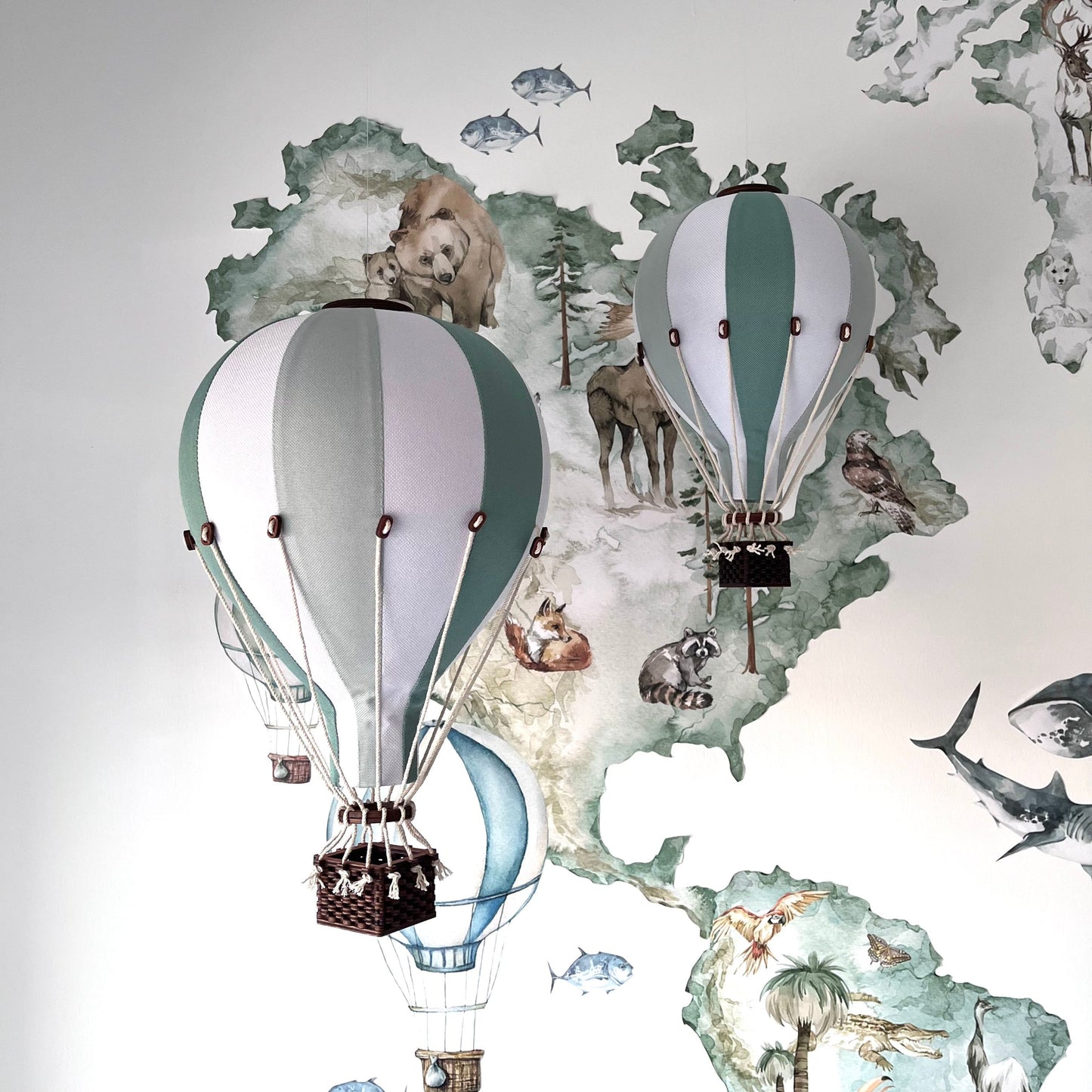 pair of green nursery balloon decor