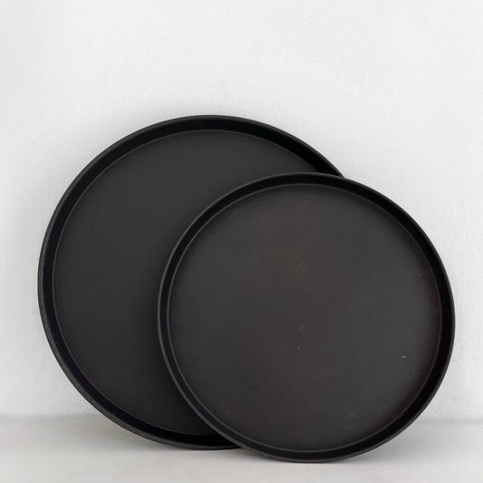 large and small black metal plates with short lip