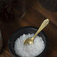 brass salt spoon used with salt cellar