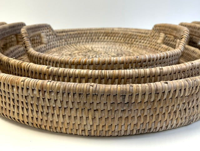 Set of woven trays on a white background