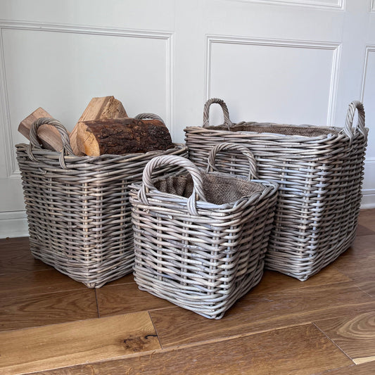 side view of 3 squared rattan baskets