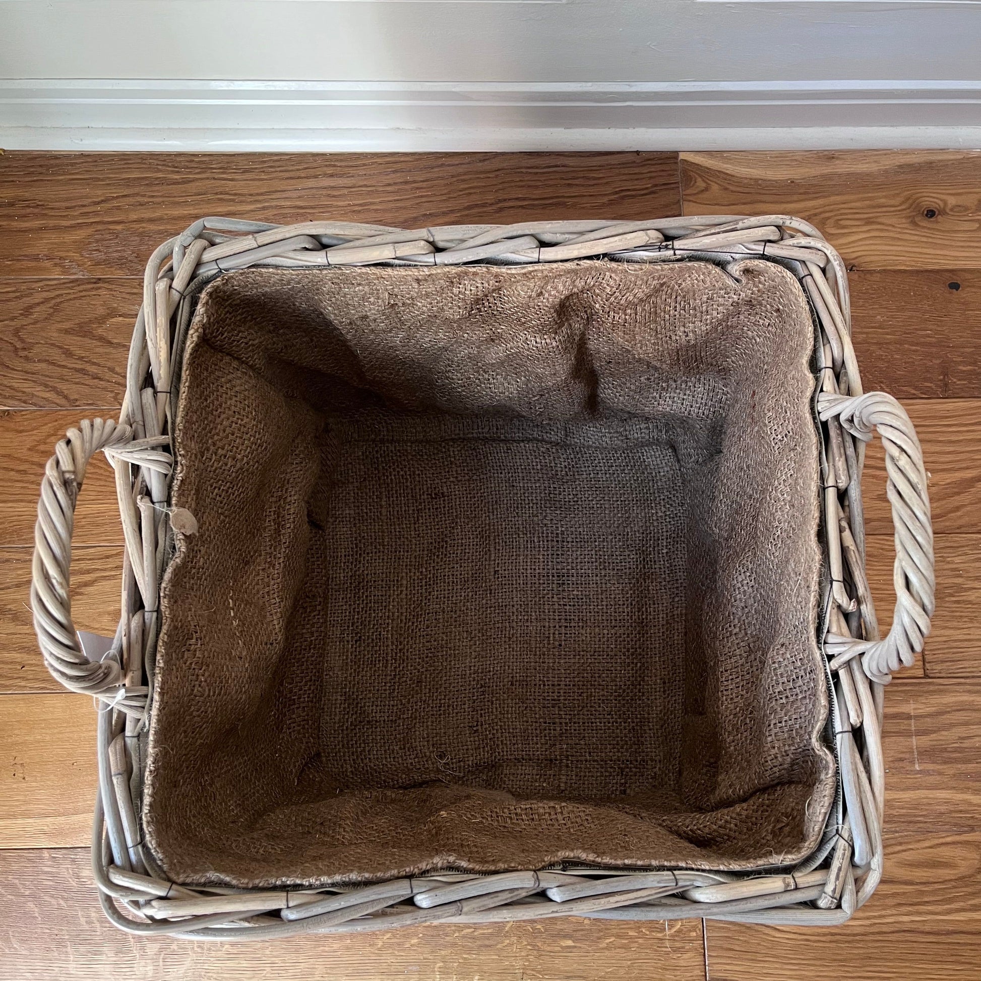 top view of square rattan basket with handles