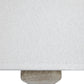 close up of white wash table lamp with shade