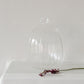 Tall ribbed glass bud vase 