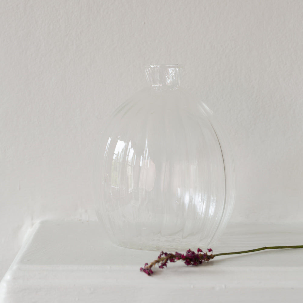 Tall ribbed glass bud vase 