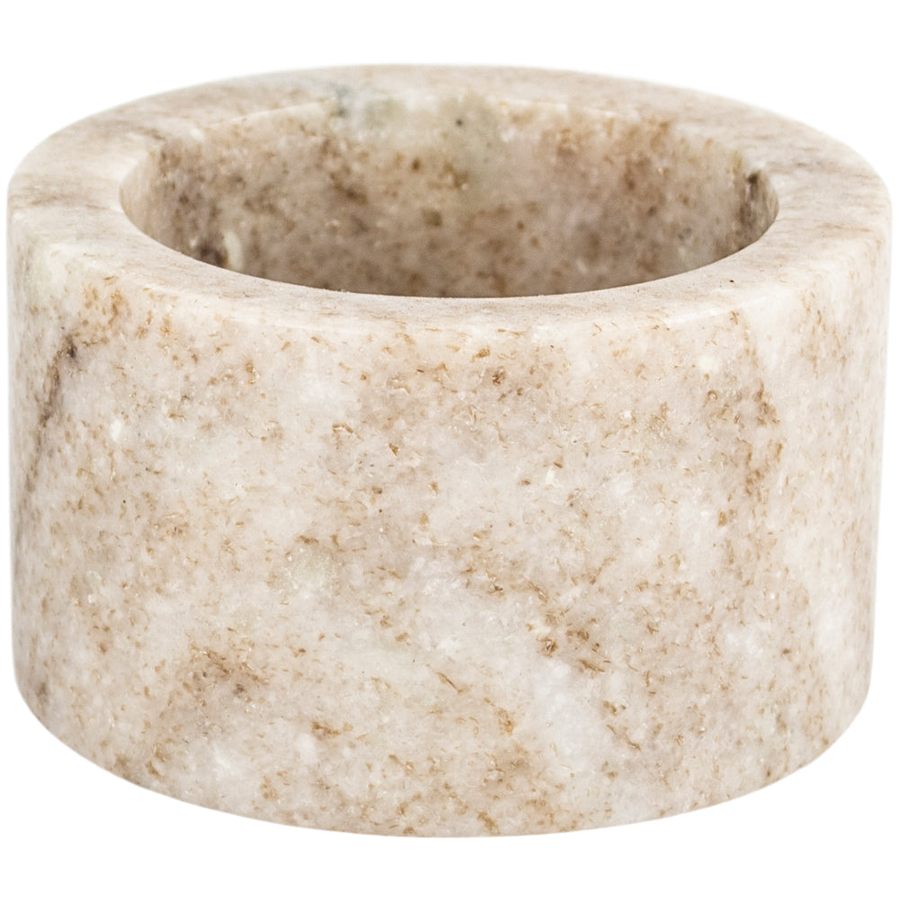 A stunning marble salt/pepper cellar used in the kitchen as a handy tool for seasoning meals